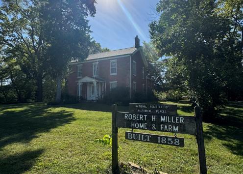 Image of Robert H Miller Home and sign